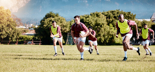 Game, sports and men playing rugby in a competition, match and running with a ball on a field. Fitness, exercise and players training for a team sport, cardio and collaboration in a park for practice