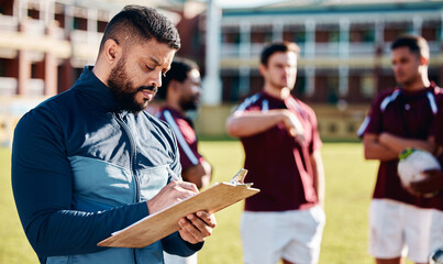 Fitness, rugby and coach with clipboard, teamwork and training for competition, workout and wellness. Male, trainer and group with healthy lifestyle, sports and practice for exercise, support or plan