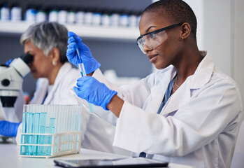 Science, black woman and pipette with tube for test, research and investigation in laboratory....