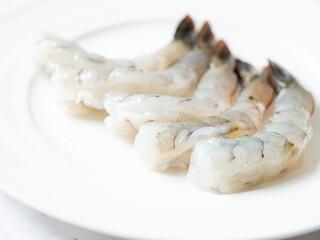 shrimp on a white plate