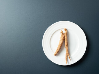 Dried ginseng on a plate