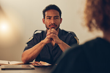 Police, investigation and man listening to woman for report, interrogation or criminal arrest. Law, crime and bribery, detective at station for money laundering interview, questions and attention. - obrazy, fototapety, plakaty