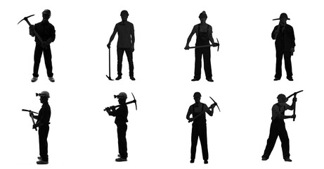 Silhouettes of many male miners with pick axes on white background
