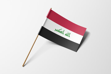 Iraq flag of small paper, isolated on white background