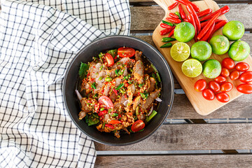 Spicy fried pork neck salad. Spicy. Very delicious.