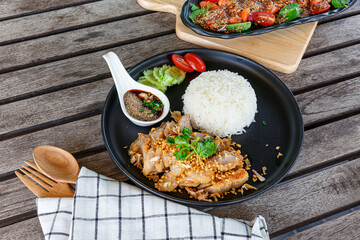 Thai fried pork neck with spicy dipping sauce