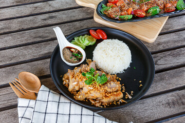 Thai fried pork neck with spicy dipping sauce