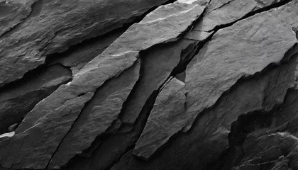 Foto op Plexiglas abstract, dark textured background with shades of grey, black, and white resembling a rugged mountain surface, conveying strength and resilience in its raw, natural beauty © Your Hand Please