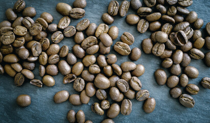 coffee beans on a dark background, top view