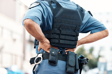 Back pain, man or police officer with injury in city from accident crime, crisis danger or gunshot...