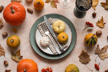 Beautiful table setting for Thanksgiving Day celebration on grunge beige background