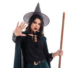 Young witch with broom on white background