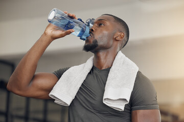 Fitness, gym and black man drinking water after workout or training for hydration, health or...