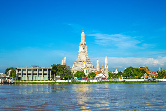 Wat Arun at the bank of Chao Phraya River in Bangkok, thailand