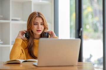 Asian girl student online learning class study online video call zoom teacher, Happy asian girl learn english language online with computer laptop.