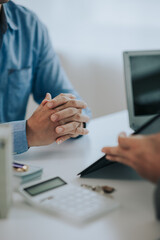 Close-up photo of a real estate agent offering a contract to purchase or rent a residence. Businessman holds small house model with property insurance at table in home sales office