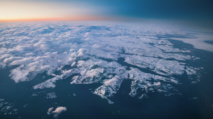 Spectacular panoramic view of the sunset over the rugged land of Southern Greenland
