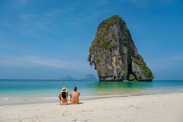 Fototapeta na wymiar Railay beach Krabi Thailand, tropical beach of Railay Krabi, couple men and woman on the beach