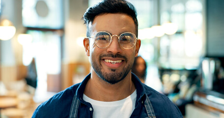 Portrait, happy man or business owner with smile in coffee shop for startup, career or service in hospitality. Mexican person, face and glasses with excitement for vision of cafe, restaurant or store