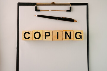 Coping Wooden Block Words Concept Background
