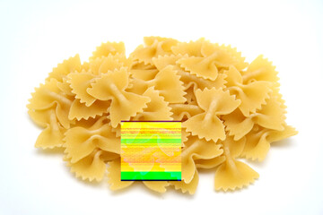 Heap of farfalle pasta isolated on white background