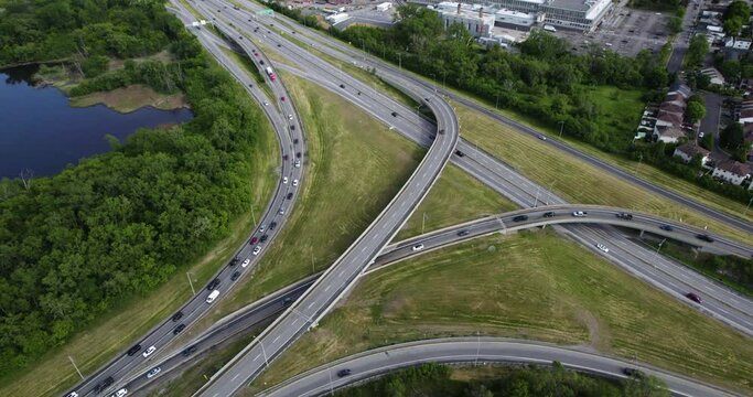 Aerial tilt shot over traffic, on a junction on road A5, in Gatineau, Canada