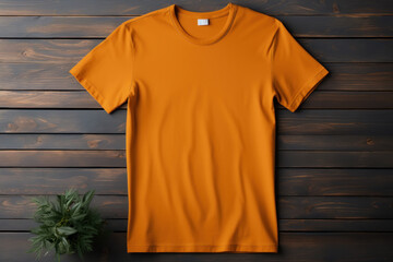 Orange color t shirt on table