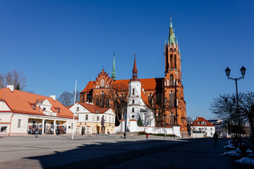 A beautiful square and streets with historical buildings on a sunny day. Kosciuszko Market Square in Bialystok, Poland, March 3, 2021
