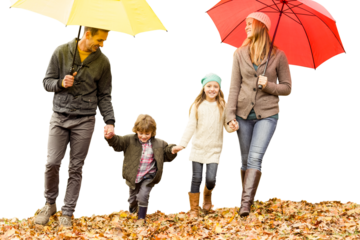 Digital png photo of happy caucasian family walking in park with umbrellas on transparent background