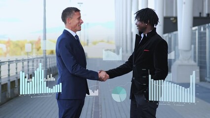 Businessmen seal deal and partnership of joint cooperation with handshake. Interracial models in modern city landscape with digital graphs and overlays - Powered by Adobe