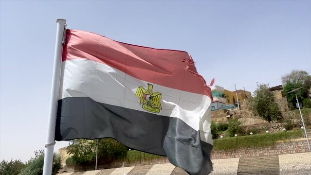Tattered and torn egyptian flag. Flag of Egypt. Egyptian decline, decadence