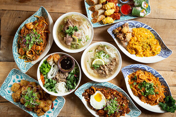 Various Southeast Asian food on the table