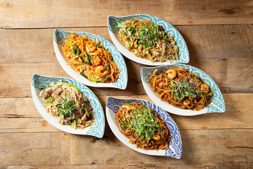 Various Southeast Asian food on the table