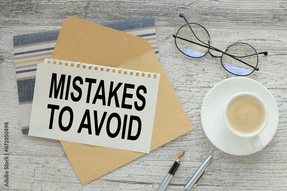 Poster mistakes to avoid . text on torn paper on an envelope