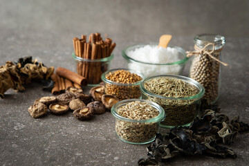Various spices, dried mushrooms, salt and pepper