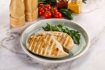 Grilled chicken breast served arugula