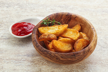 Fried rustic potato with tomato ketcup