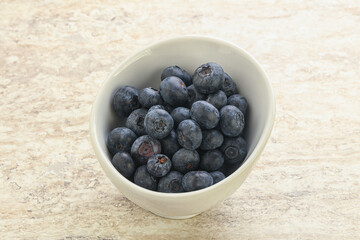Sweet ripe blueberry heap in the bowl