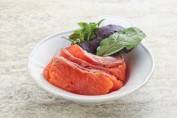 Sliced salmon fillet starter snack