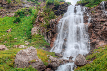 Fototapeta na wymiar Imertinsky waterfall in the Caucasian nature reserve. Russia.