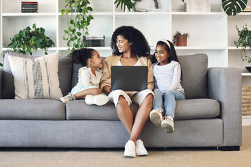 Mother, children and laptop in family home living room for remote work, online education and wifi. Woman and girl kids together on couch with internet for learning, games and watch movies or relax - obrazy, fototapety, plakaty