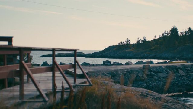 Riprap And Wooden Deck In Sorvagen Harbor