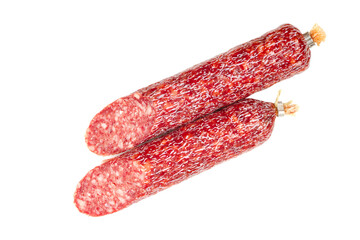 Sliced salami sausage on white background. Two halves of smoked salami sausage.