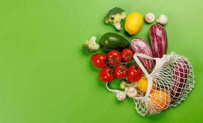 Mesh bag filled with a variety of vegetables
