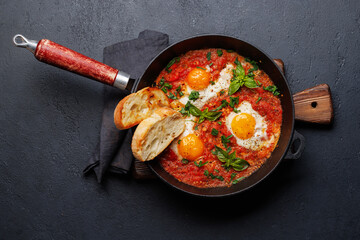 Delicious shakshuka breakfast in a pan
