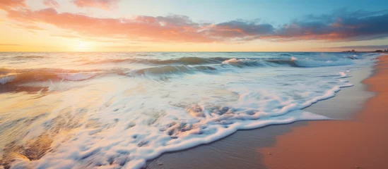 Papier Peint photo Violet pâle After the storm the shoreline of the Baltic Sea is adorned with the remnants of crashing waves and splashes As the sun sets casting a soft golden light the water s surface texture becomes a 