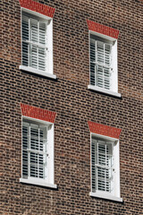 Facade in the beautiful Mayfair district in the West End of London, on an autumn warm day