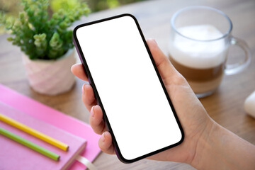 woman hand hold phone with isolated screen pink notepad in office