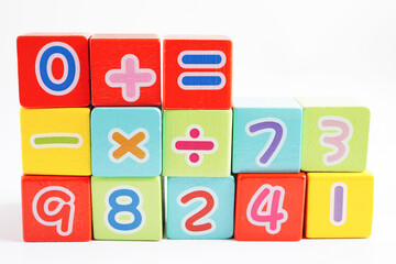 Number wood block cubes for learning Mathematic, education math concept.