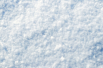 Background with snow texture, snow surface on a sunny day